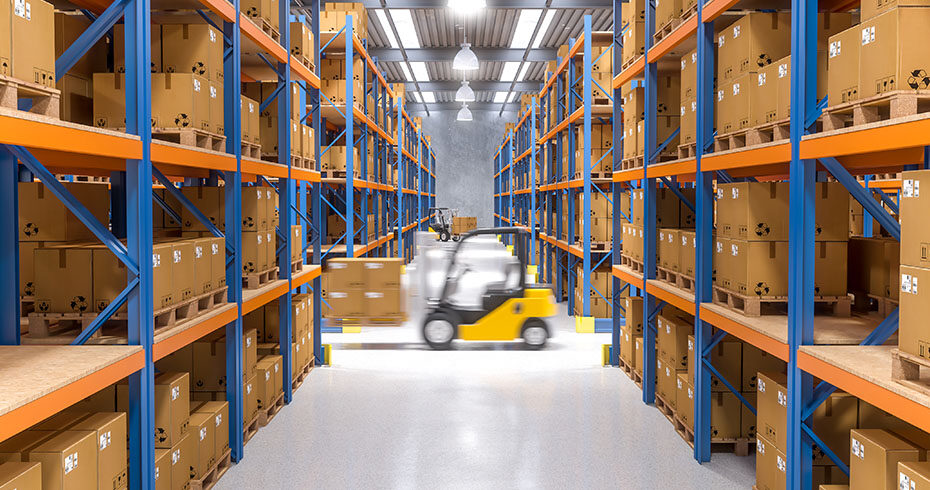 A warehouse with racking and fork lift truck